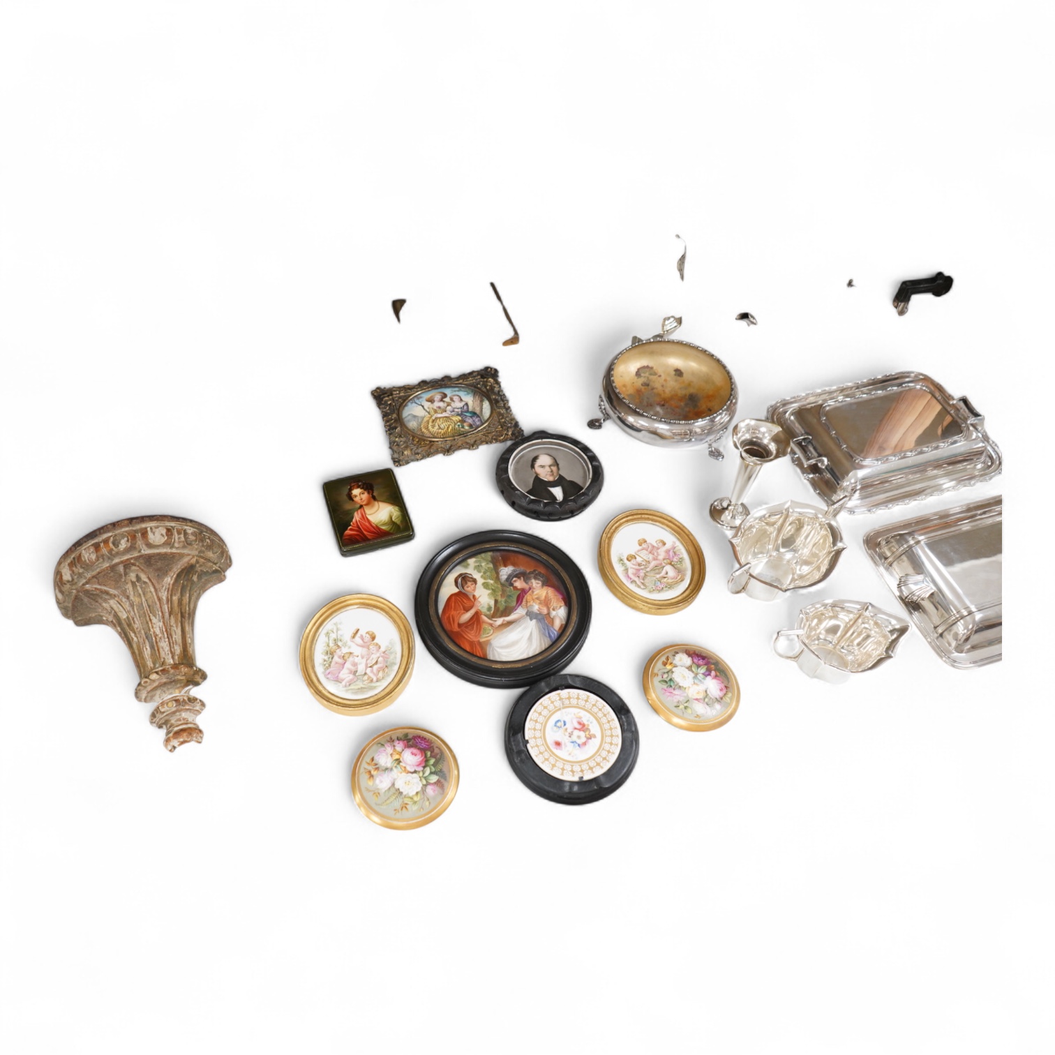 A collection of 19th century porcelain panels, pot lids and plaques to include a pair of hand painted floral lids, Russian lacquered box depicting a lady and a late 19th century Continental brass framed convex oval ename
